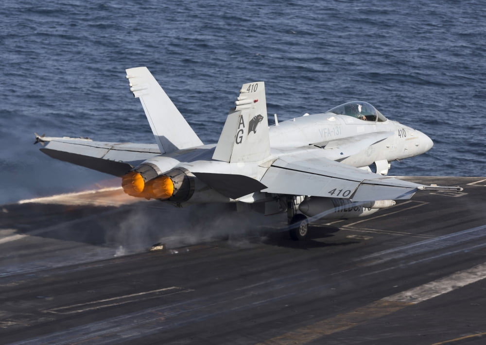 An FA-18C Hornet taking off from the flight deck of USS Dwight D Eisenhower Canvas Art - Gert KromhoutStocktrek Images (33 x 24)