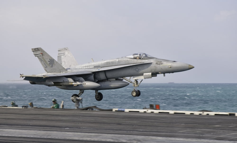 An FA-18C Hornet taking off from the flight deck of USS George HW Bush Canvas Art - Giovanni CollaStocktrek Images (18 x 11)