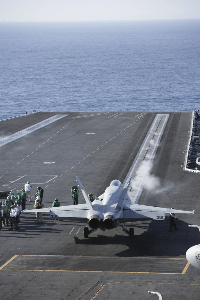 An FA-18D Hornet launches from the aircraft carrier USS Ronald Reagan Canvas Art - Stocktrek Images (23 x 34)