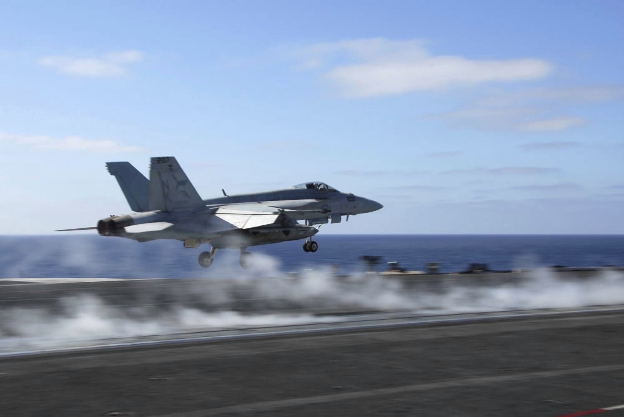 An FA-18E Super Hornet catapults from the aircraft carrier USS Ronald Reagan Canvas Art - Stocktrek Images (35 x 23)