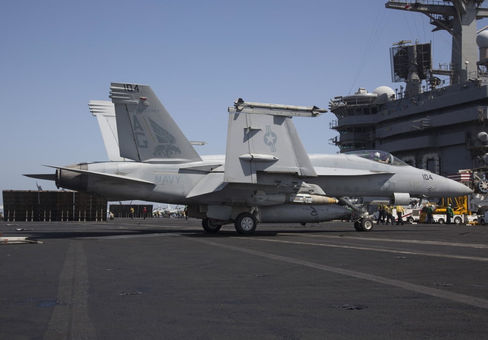 An FA-18E Super Hornet during flight operations on USS Dwight D Eisenhower Canvas Art - Gert KromhoutStocktrek Images (17 x 12)