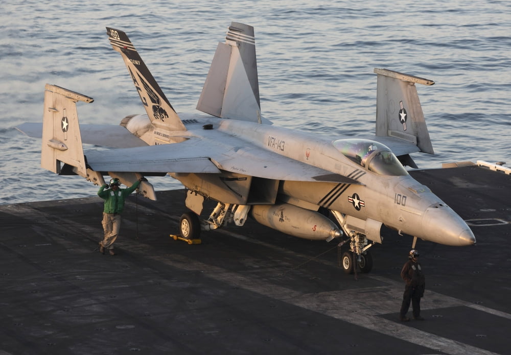 An FA-18E Super Hornet during flight operations on USS Dwight D Eisenhower Canvas Art - Gert KromhoutStocktrek Images (34 x 24)