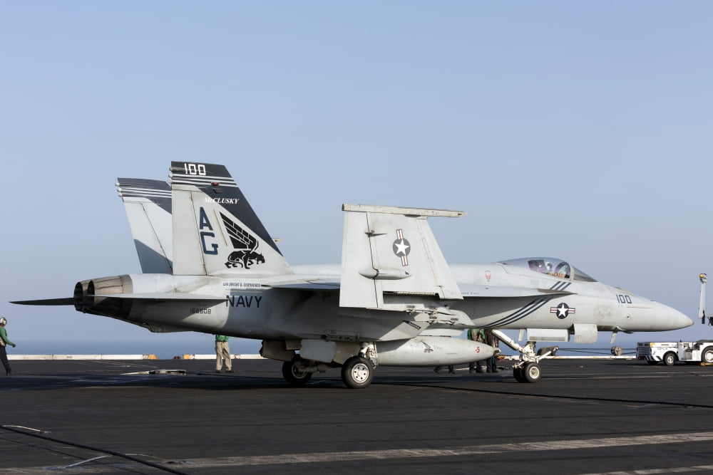An FA-18E Super Hornet during flight operations on USS Dwight D Eisenhower Canvas Art - Gert KromhoutStocktrek Images (35 x 23)