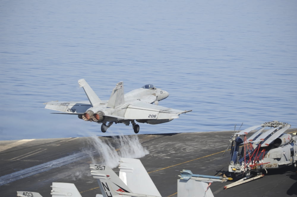 An FA-18E Super Hornet launches from USS Nimitz Canvas Art - Stocktrek Images (34 x 23)