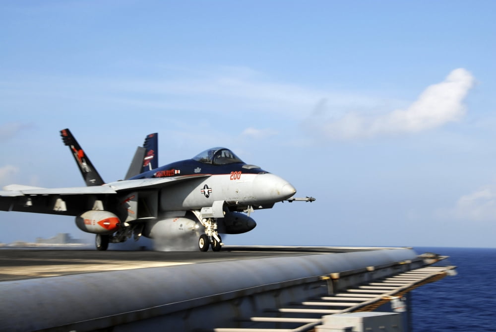 An FA-18E Super Hornet launches from the aircraft carrier USS Ronald Reagan Canvas Art - Stocktrek Images (35 x 23)