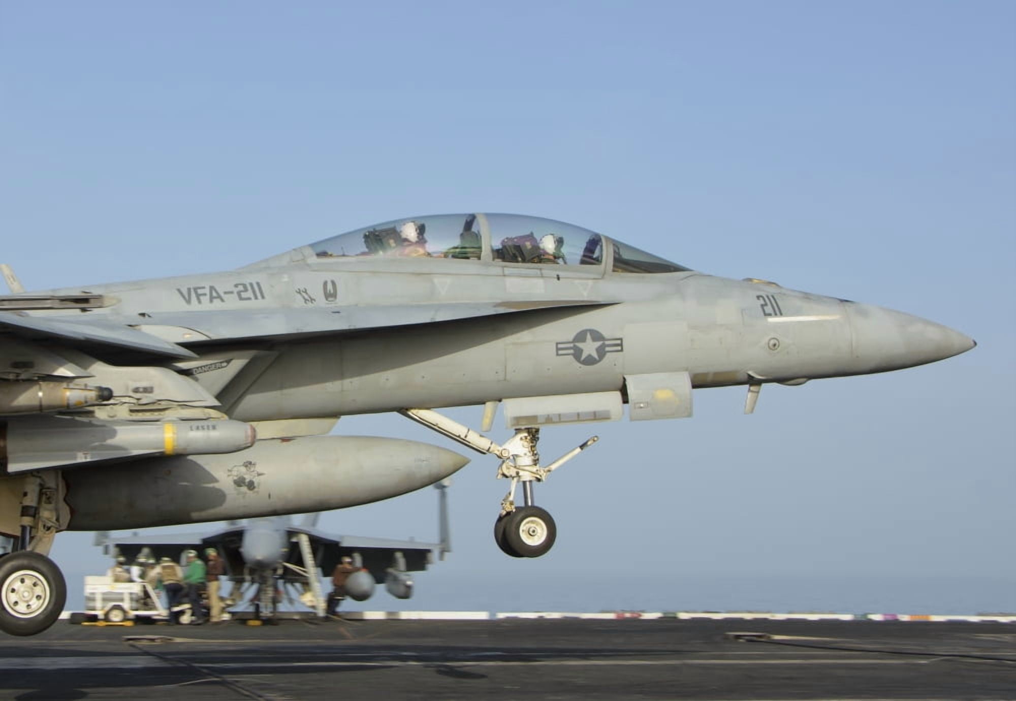 An FA-18E Super Hornet makes an arrested landing aboard an aircraft carrier Canvas Art - Giovanni CollaStocktrek Images (17 x 12)