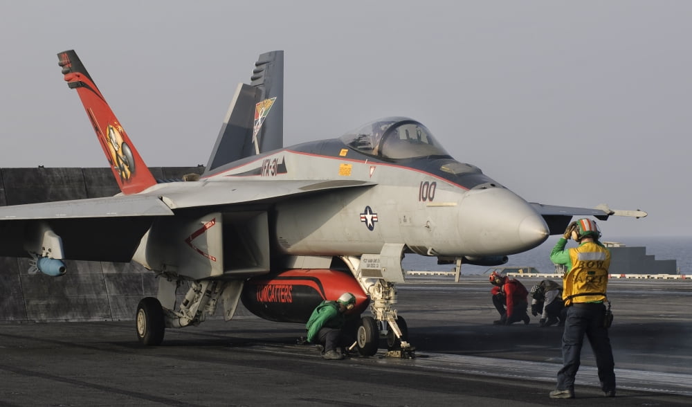 An FA-18E Super Hornet moving to the catapult aboard USS George HW Bush Canvas Art - Giovanni CollaStocktrek Images (36 x 22)