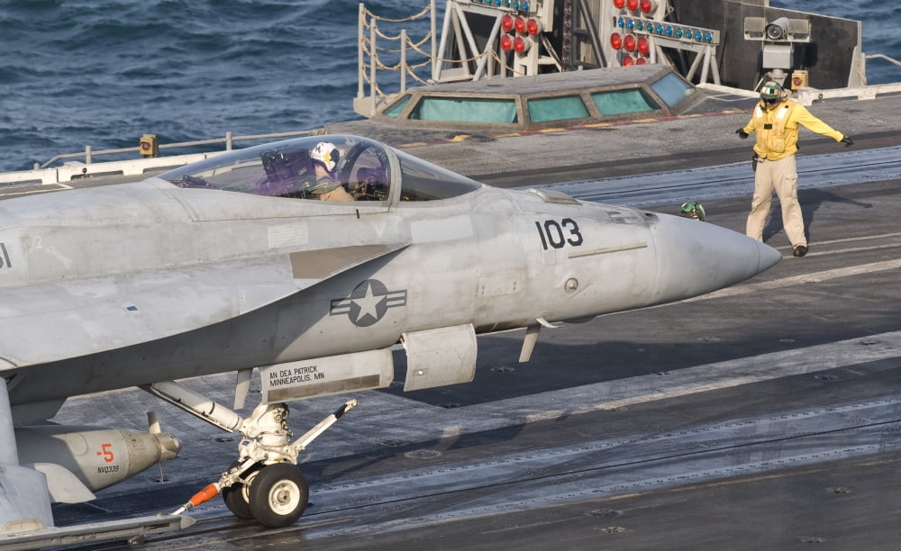 An FA-18E Super Hornet on the catapult aboard USS George HW Bush Canvas Art - Giovanni CollaStocktrek Images (36 x 22)