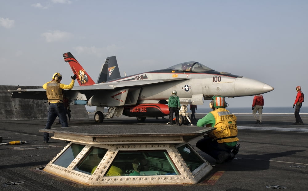 An FA-18E Super Hornet on the flight deck of USS George HW Bush Canvas Art - Giovanni CollaStocktrek Images (36 x 22)
