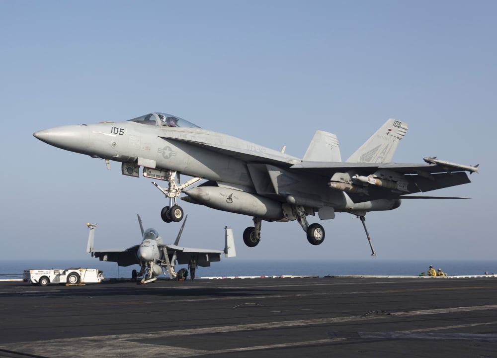 An FA-18E Super Hornet prepares for landing aboard USS Dwight D Eisenhower Canvas Art - Gert KromhoutStocktrek Images (17 x 12)