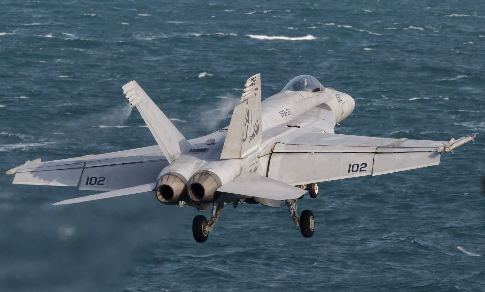 An FA-18E Super Hornet taking off from USS George HW Bush Canvas Art - Giovanni CollaStocktrek Images (36 x 22)