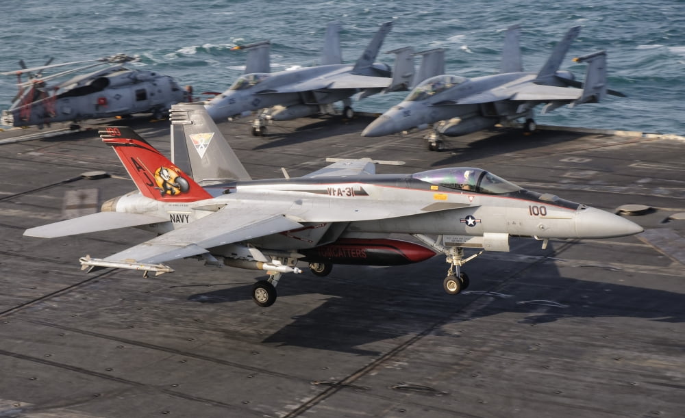 An FA-18E Super Hornet trap landing aboard USS George HW Bush Canvas Art - Giovanni CollaStocktrek Images (18 x 11)