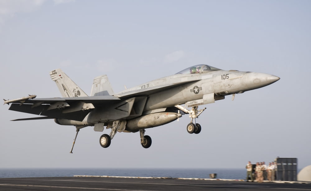 An FA-18E Super Hornet trap landing aboard USS George HW Bush Canvas Art - Giovanni CollaStocktrek Images (18 x 11)