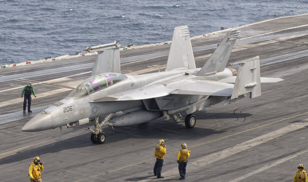 An FA-18F Super Hornet aboard USS George HW Bush Canvas Art - Giovanni CollaStocktrek Images (18 x 11)