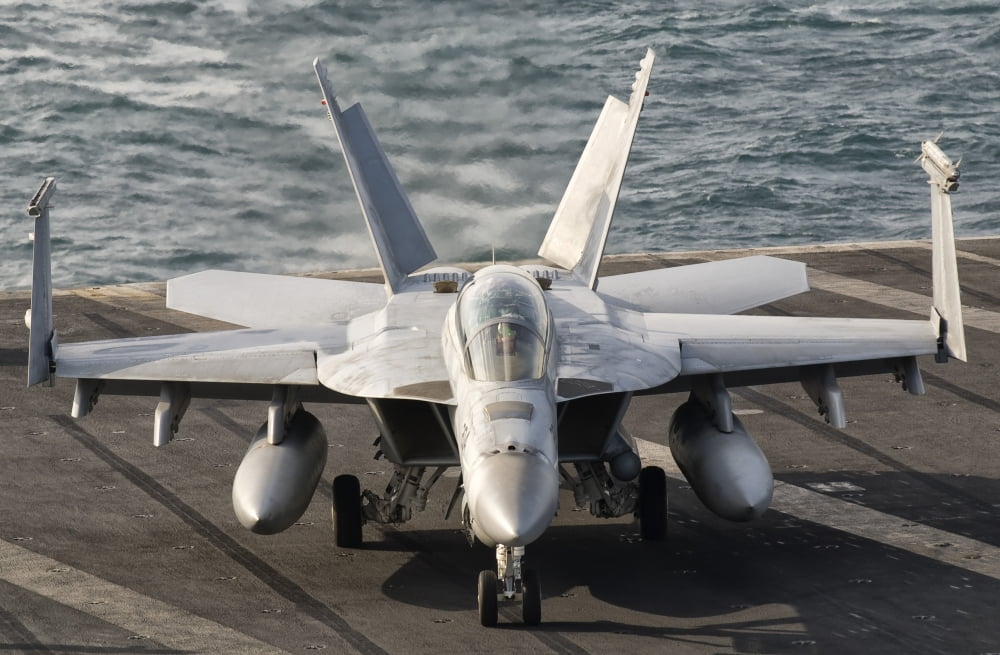 An FA-18F Super Hornet aboard USS George HW Bush Canvas Art - Giovanni CollaStocktrek Images (18 x 12)