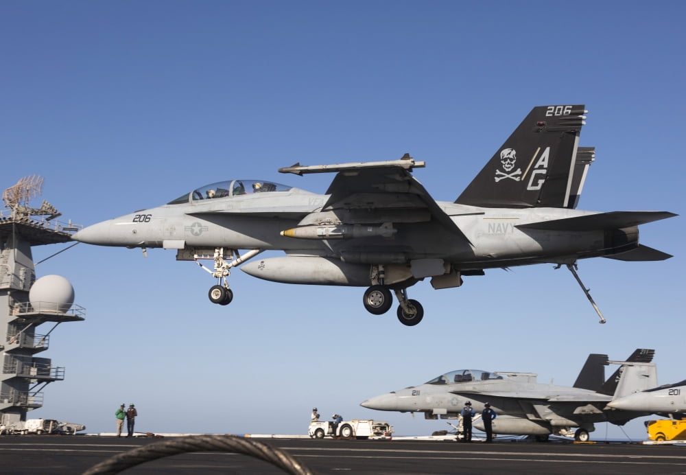 An FA-18F Super Hornet during flight operations on USS Dwight D Eisenhower Canvas Art - Gert KromhoutStocktrek Images (17 x 12)
