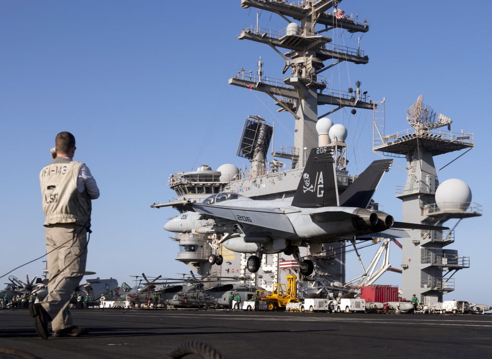 An FA-18F Super Hornet during flight operations on USS Dwight D Eisenhower Canvas Art - Gert KromhoutStocktrek Images (17 x 12)