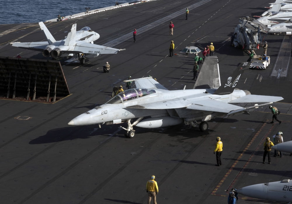 An FA-18F Super Hornet during flight operations on USS Dwight D Eisenhower Canvas Art - Gert KromhoutStocktrek Images (17 x 12)