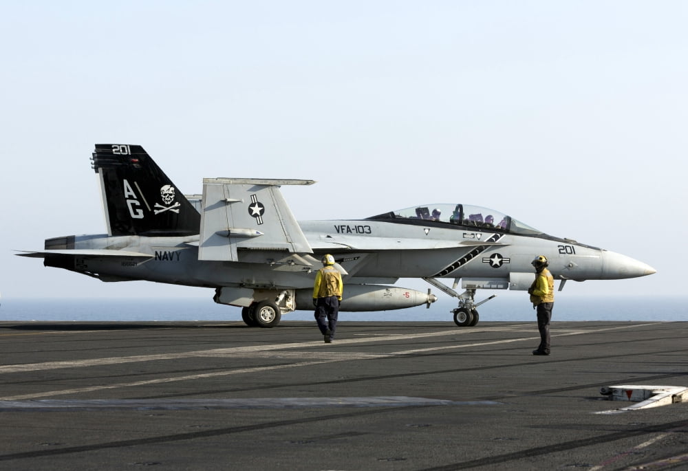 An FA-18F Super Hornet during flight operations on USS Dwight D Eisenhower Canvas Art - Gert KromhoutStocktrek Images (34 x 23)