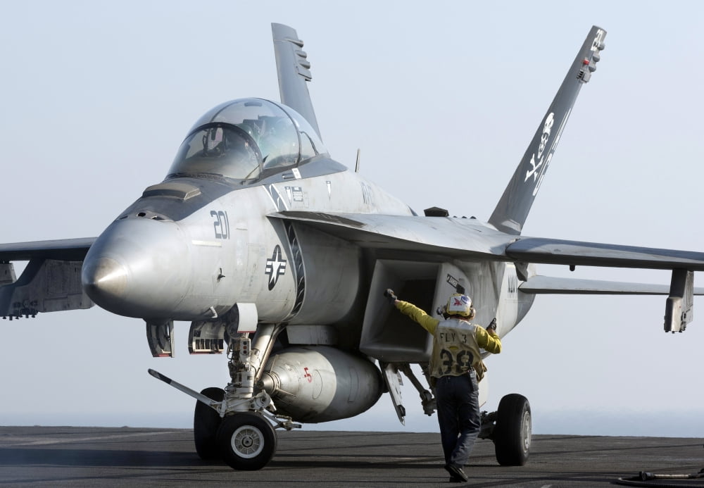 An FA-18F Super Hornet during flight operations on USS Dwight D Eisenhower Canvas Art - Gert KromhoutStocktrek Images (34 x 24)