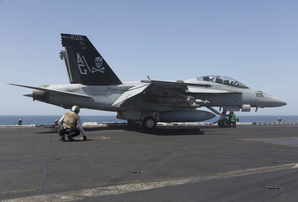 An FA-18F Super Hornet during flight operations on USS Dwight D Eisenhower Canvas Art - Gert KromhoutStocktrek Images (35 x 24)
