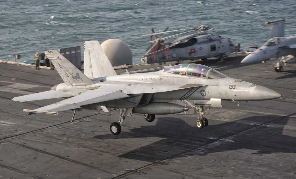 An FA-18F Super Hornet landing aboard USS George HW Bush Canvas Art - Giovanni CollaStocktrek Images (36 x 22)