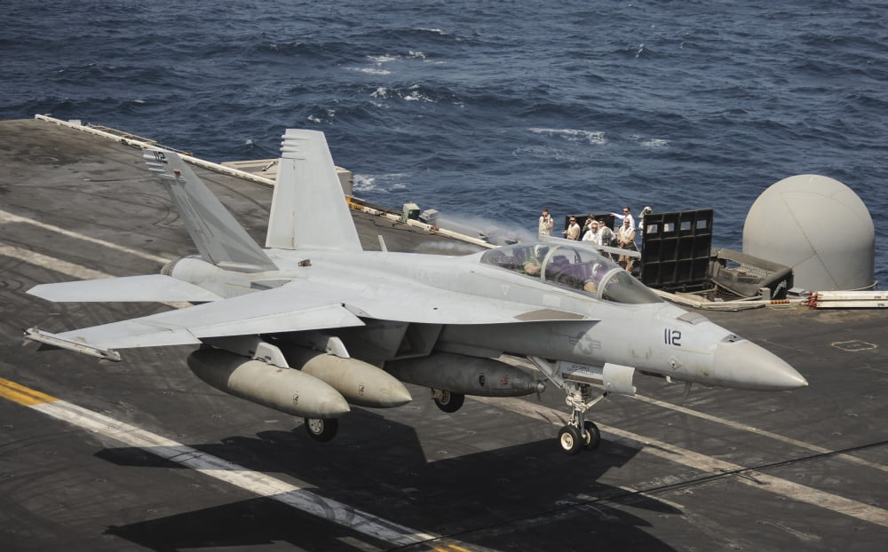 An FA-18F Super Hornet lands on the flight deck of USS Nimitz Canvas Art - Stocktrek Images (36 x 23)