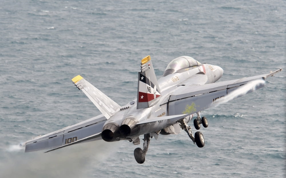 An FA-18F Super Hornet launches from USS Abraham Lincoln Canvas Art - Stocktrek Images (36 x 23)