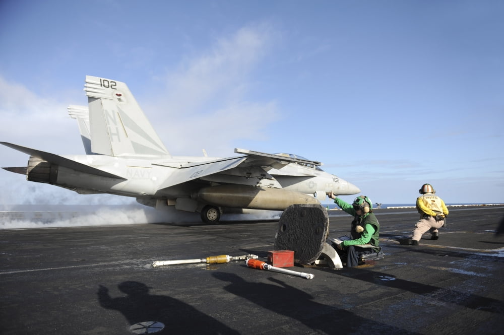 An FA-18F Super Hornet launches from USS Nimitz Canvas Art - Stocktrek Images (34 x 23)