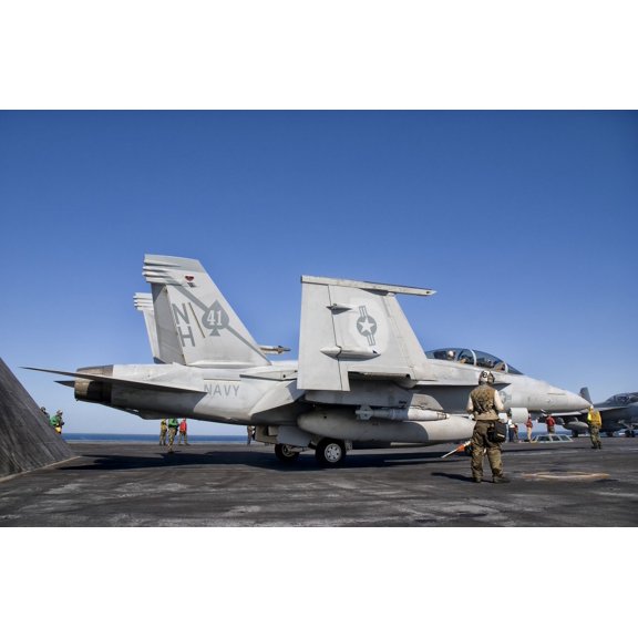 An FA-18F Super Hornet moves into launch position aboard aircraft carrier USS Nimitz Canvas Art - Giovanni CollaStocktrek Images (35 x 23)