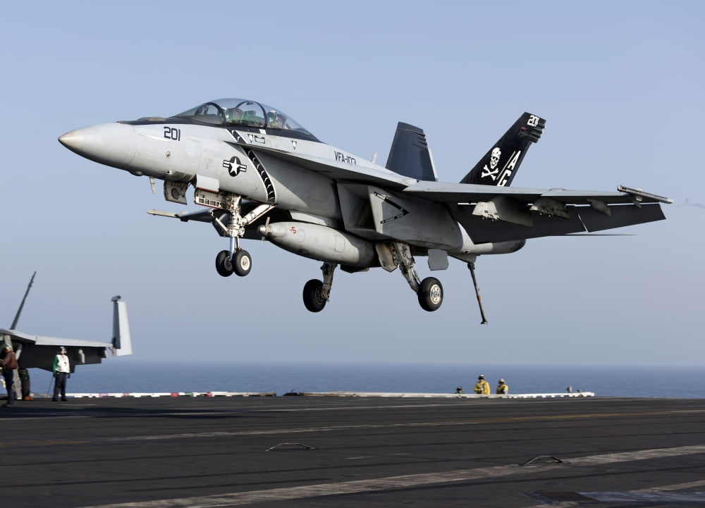 An FA-18F Super Hornet prepares for landing aboard USS Dwight D Eisenhower Canvas Art - Gert KromhoutStocktrek Images (17 x 12)