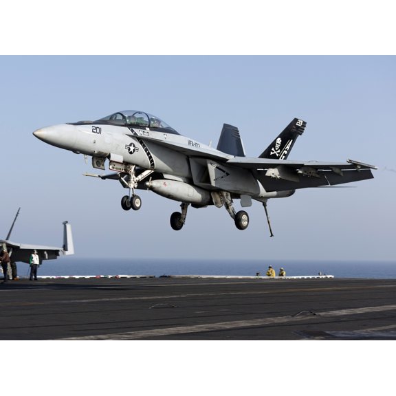 An FA-18F Super Hornet prepares for landing aboard USS Dwight D Eisenhower Canvas Art - Gert KromhoutStocktrek Images (17 x 12)