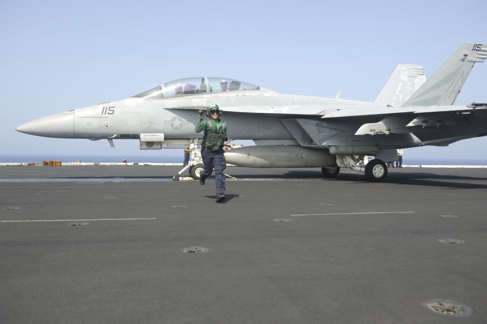 An FA-18F Super Hornet prepares to launch Canvas Art - Stocktrek Images (35 x 23)