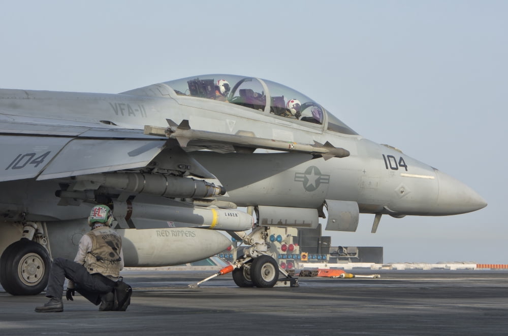 An FA-18F Super Hornet ready to launch from a catapult Canvas Art - Giovanni CollaStocktrek Images (34 x 23)