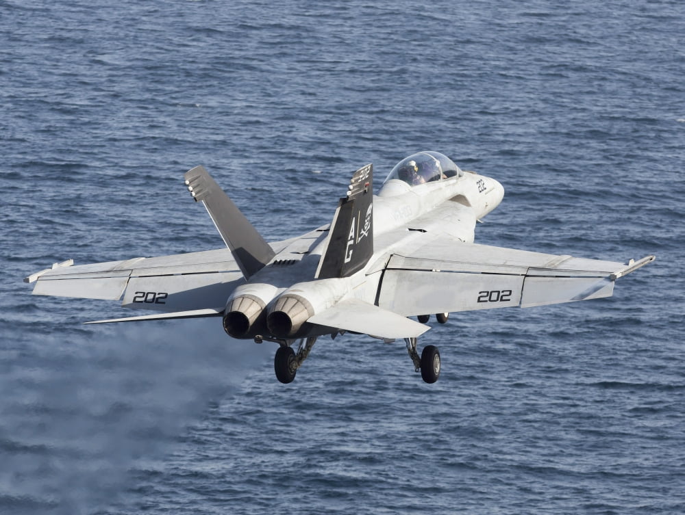 An FA-18F Super Hornet takes off during flight operations in the Arabian Sea Canvas Art - Gert KromhoutStocktrek Images (33 x 25)