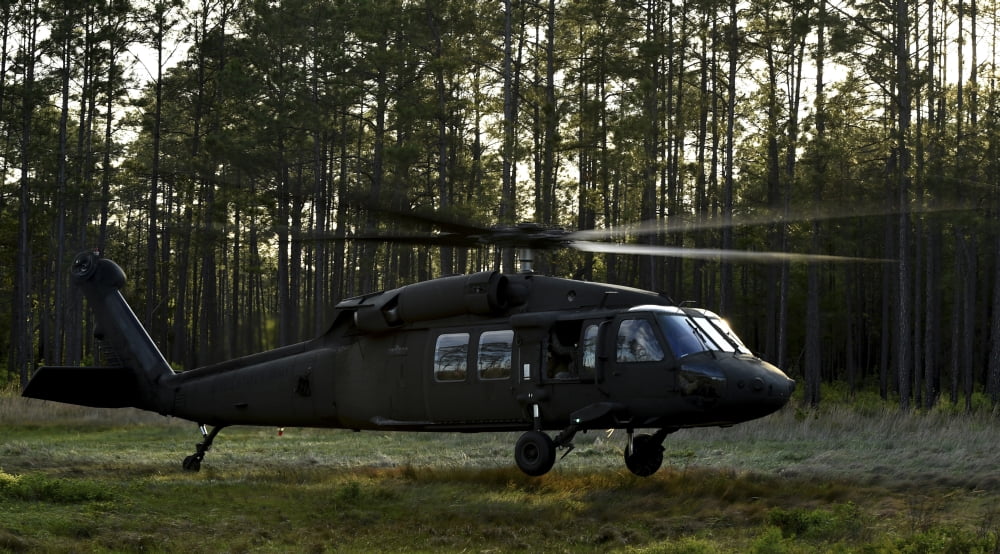 An HH-60 Pave Hawk evacuates injured patients Canvas Art - Stocktrek Images (37 x 21)