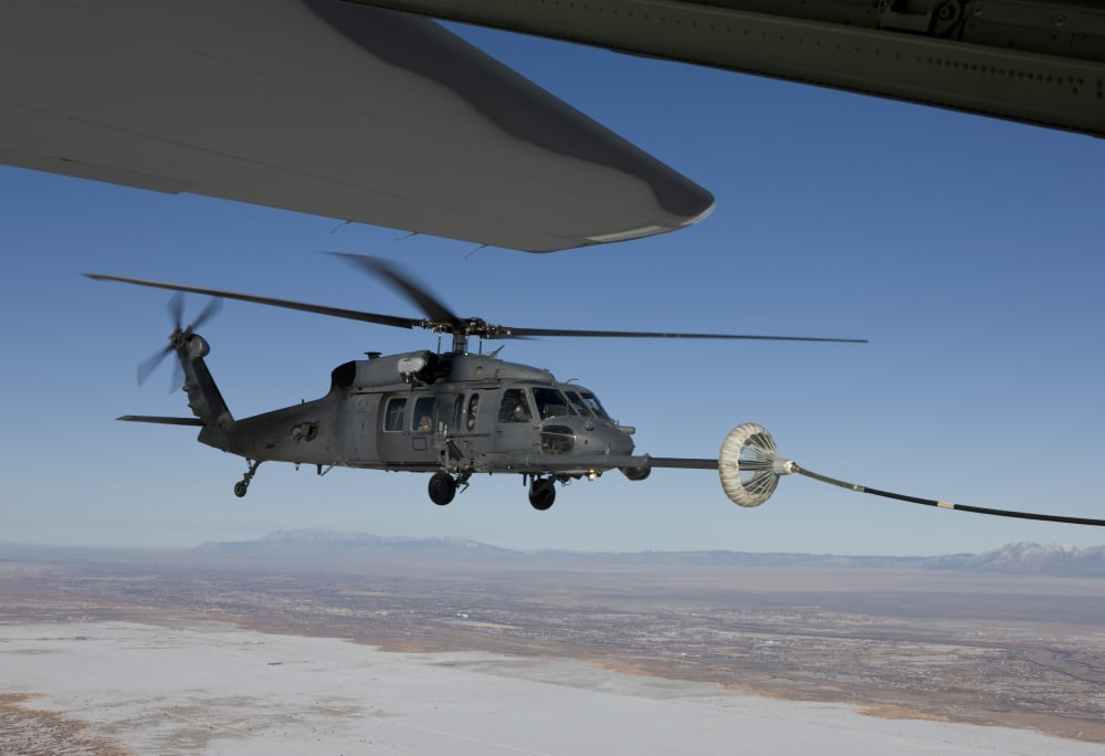 An HH-60G Pave Hawk conducts aerial refueling from an HC-130 Canvas Art - HIGH-G ProductionsStocktrek Images (18 x 12)