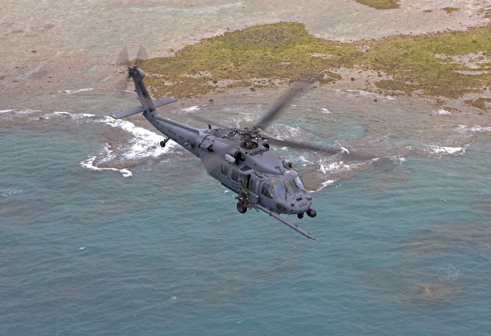 An HH-60G Pave Hawk flies along the coastline of Okinawa Japan Canvas Art - HIGH-G ProductionsStocktrek Images (18 x 12)