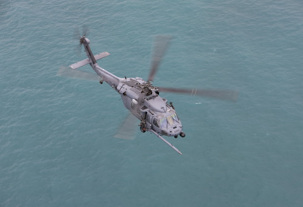 An HH-60G Pave Hawk flies along the coastline of Okinawa Japan Canvas Art - HIGH-G ProductionsStocktrek Images (18 x 12)