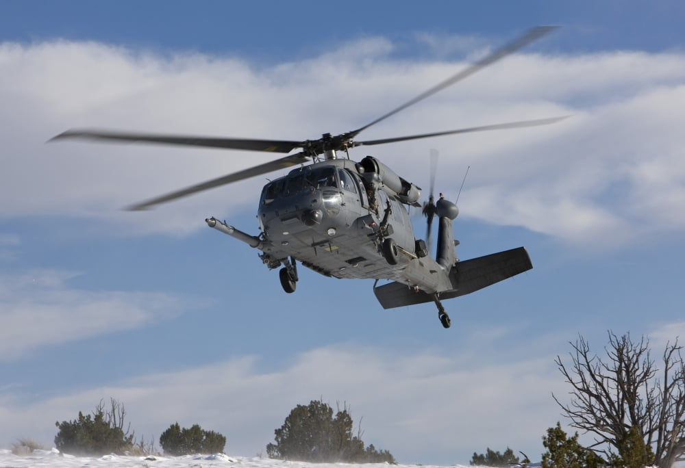 An HH-60G Pave Hawk flys low over a landing zone in New Mexico Canvas Art - HIGH-G ProductionsStocktrek Images (35 x 24)