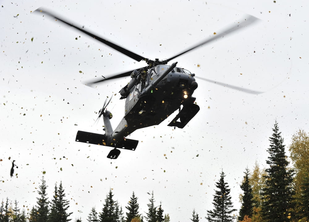 An HH-60G Pave Hawk helicopter prepares for landing Canvas Art - Stocktrek Images (34 x 24)