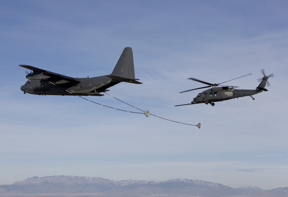 An HH-60G Pave Hawk prepares for aerial refueling from an HC-130 Canvas Art - HIGH-G ProductionsStocktrek Images (35 x 24)