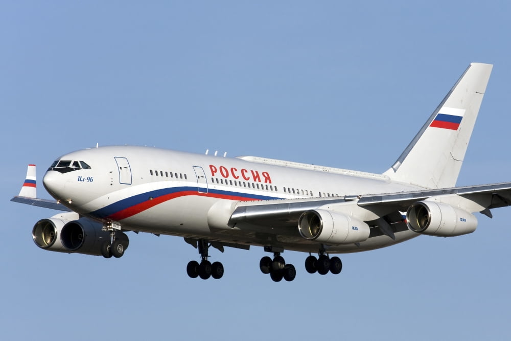 An Ilyushin Il-96 airliner prepares for landing Canvas Art - Anton BalakchievStocktrek Images (18 x 12)