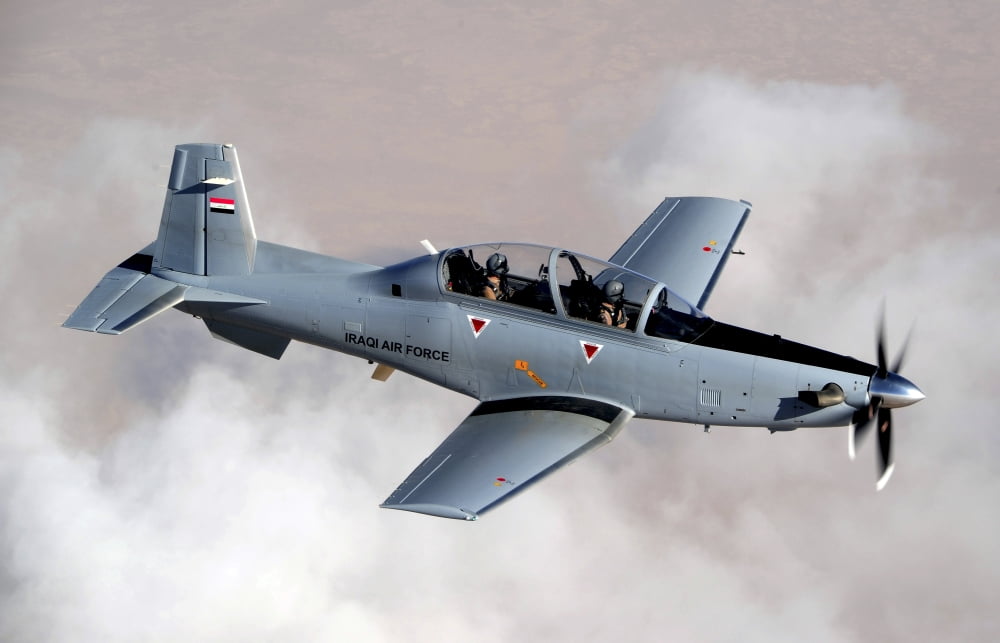 An Iraqi Air Force T-6 Texan trainer aircraft over Tikrit Iraq Canvas Art - Stocktrek Images (35 x 23)