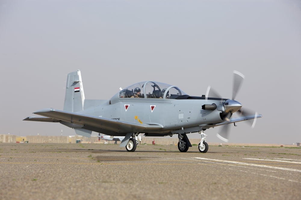 An Iraqi Air Force T-6 Texan trainer aircraft taxis out for a flight over Tikrit Iraq Canvas Art - Terry MooreStocktrek Images (18 x 12)