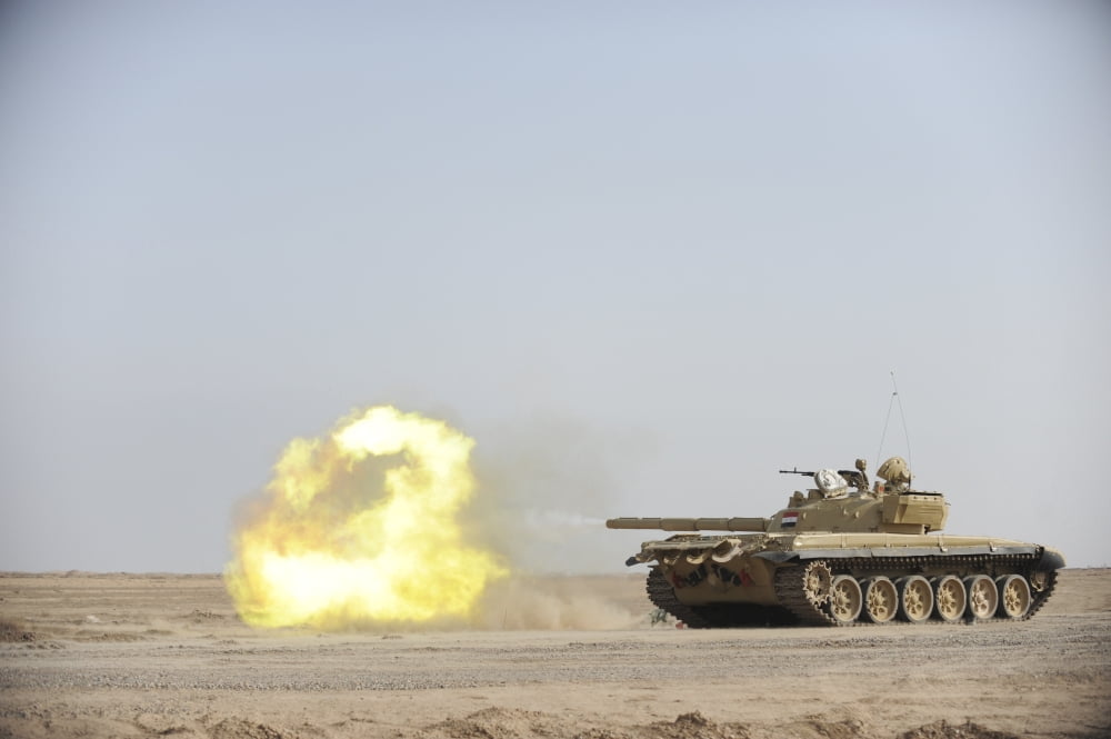 An Iraqi T-72 tank fires at the Besmaya Gunnery Range Iraq Canvas Art - Stocktrek Images (35 x 23)