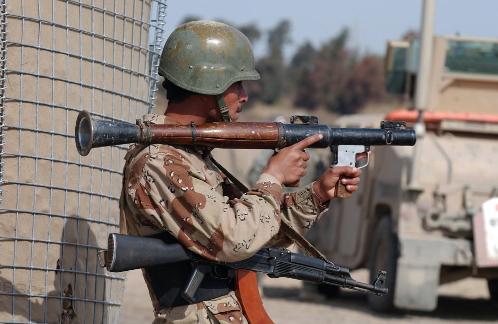 An Iraqi army soldier aims his rocket launcher Canvas Art - Stocktrek Images (34 x 23)