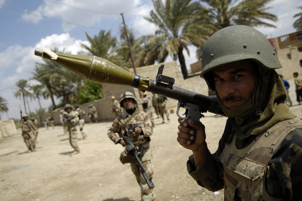 An Iraqi army soldier provides security with a rocket-propelled grenade launcher Canvas Art - Stocktrek Images (34 x 23)