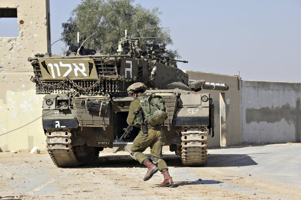 An Israel Defense Force Merkava Mark II main battle tank in urban warfare Canvas Art - Ofer ZidonStocktrek Images (18 x 12)