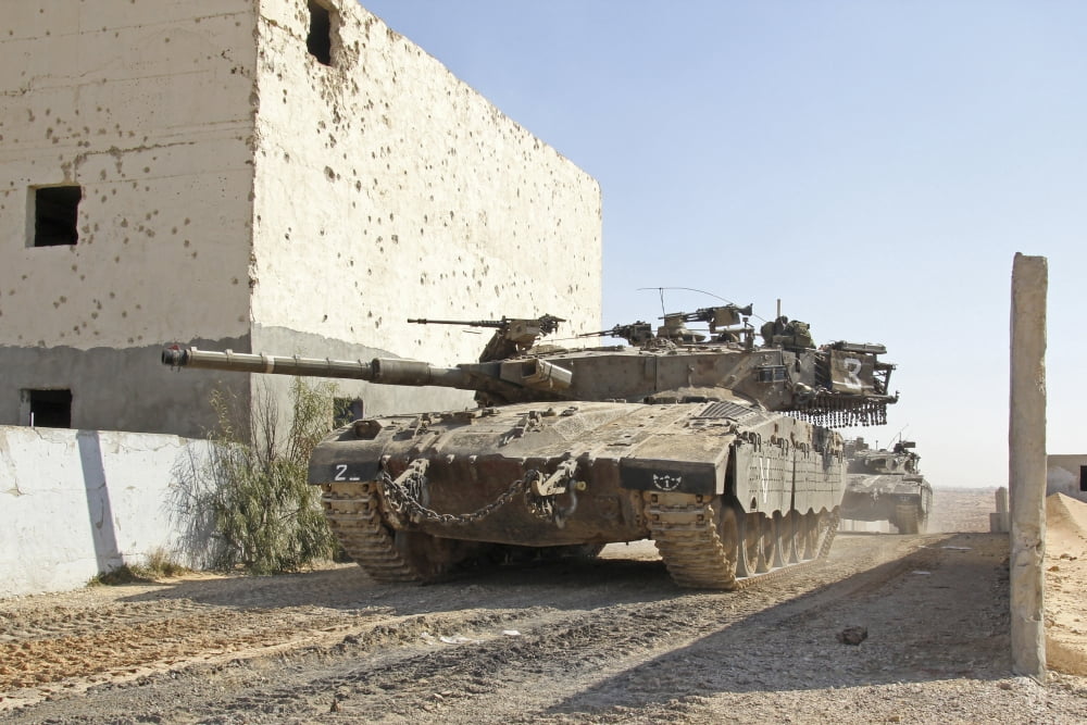 An Israel Defense Force Merkava Mark II main battle tank in urban warfare Canvas Art - Ofer ZidonStocktrek Images (18 x 12)